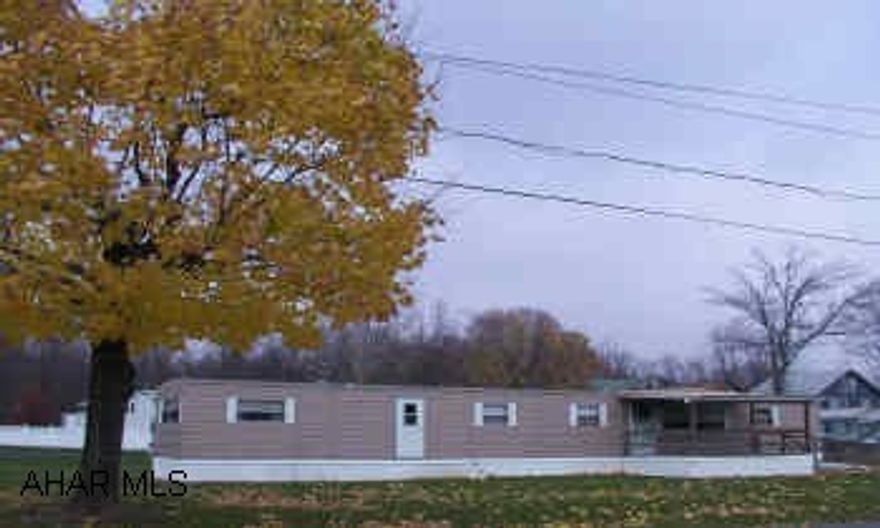 Immaculate 3 bedroom mobile home with new carpet and linoleum, CA, appliances.  On lovely 89x120 corner lot.  Build your new home here!  Public water/sewer and underground utilities. Immaculate 3 bedroom mobile home with new carpet and linoleum, CA, appliances.  On lovely 89x120 corner lot.  Build your new home here!  Public water/sewer and underground utilities.  Take Rt 865 to N 1st St.  Make L Take R on to N Cambria St  Go around curve take R on to Laurel Street.