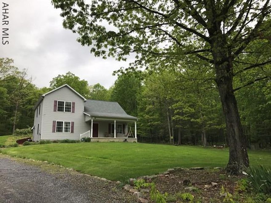 Wild life and nature lovers will love this wonderfully located home nestled in the woods between Bedford and Cumberland Maryland. The 3 bedroom, 2 bath open concept home on 11 +/- acres allows nature to be part of the space through its many windows. Hardwood floors, lovely kitchen, covered porch overlooking the pond and 3 seasons sunroom add to the appeal. The second floor offers a private guest retreat and loft and/or office. Wild life is abundant and the home would also make a fabulous hunting retreat or vacation home. All appliances convey.