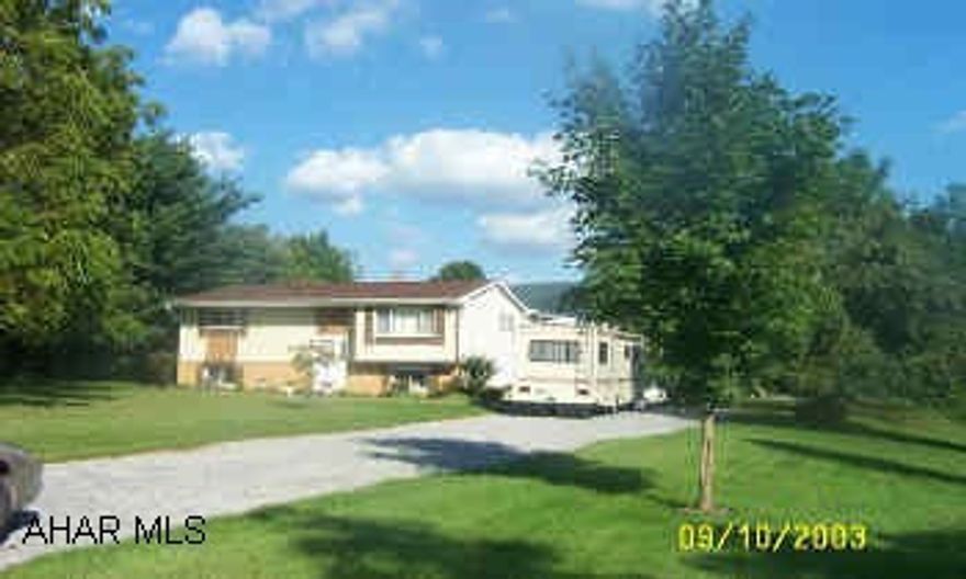Immaculate 4 Bedroom / 2  Bath Bi-level on 2 wooded acres. Open Floor Plan. Covered Parking for 5 vehicles. Hot Water Heat,  C/A, Great View Sinking Valley. From Burger King turn down Kettle Street. Go Excatly 7 Miles. House is on the right.Immaculate 4 Bedroom / 2  Bath Bi-level on 2 wooded acres. Open Floor Plan. Covered Parking for 5 vehicles. Hot Water Heat,  C/A, Great View