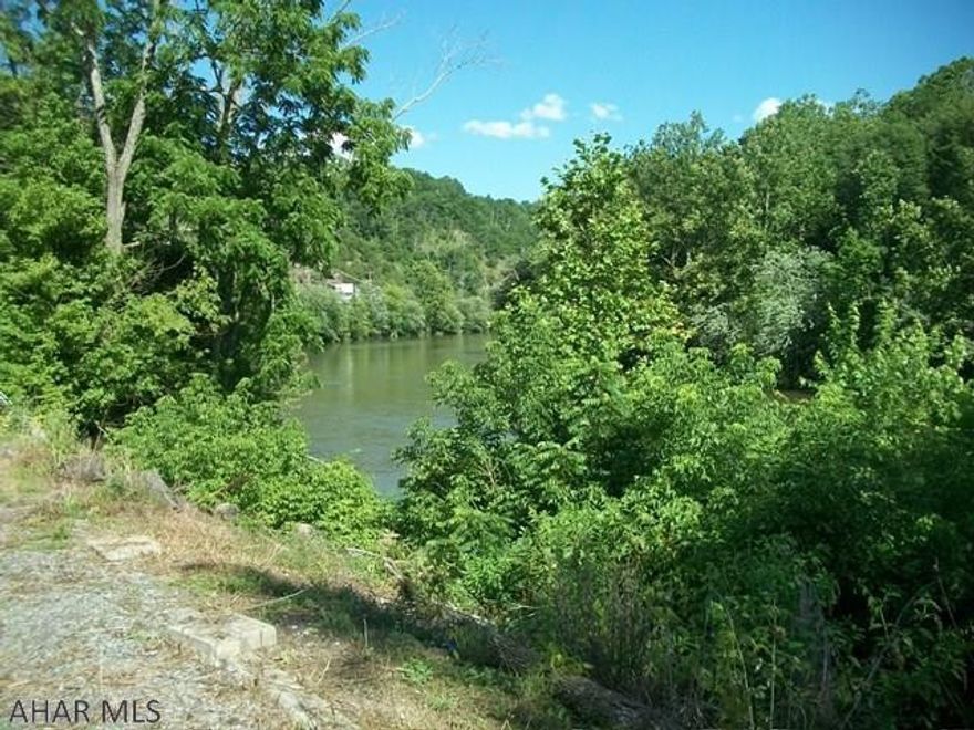 This great piece of land borders the Juniata River.  The land has great potential.  It currently has electric, well and a septic tank.  Great building lot off of Route 30.  Easy access to I99, Pa turnpike, I70.  Don't miss the opportunity to build a home or business at this great location.