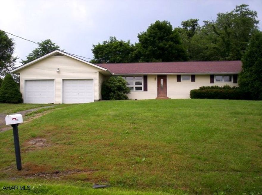Ranch home on half an acre with three bedrooms, 1 full bath, living room, kitchen, dining room and a 2 bay garage. Roomy back yard. A must see, won't last long at this price!