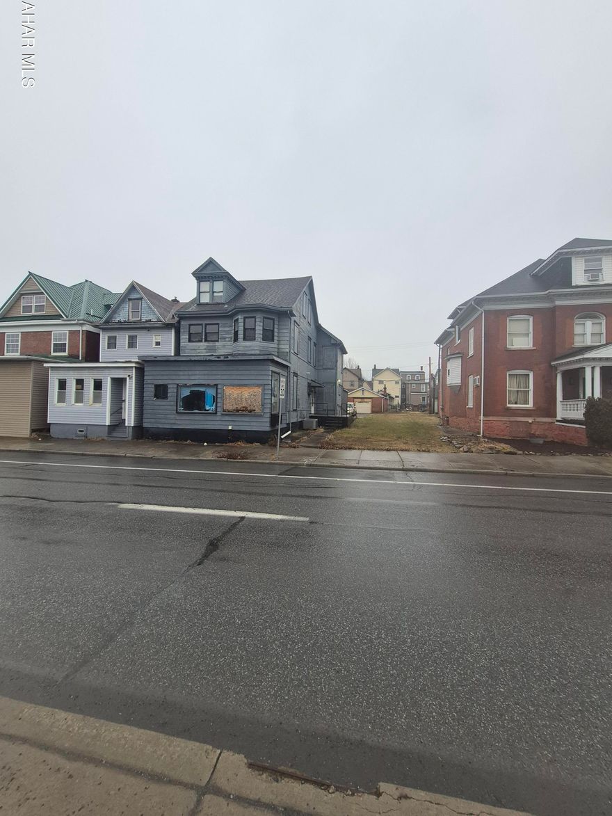 This versatile commercial property offers incredible space and flexibility for your business vision. The open first floor provides a spacious layout ideal for retail, office, or service use, and includes a large first-floor storage room for added convenience. Two additional floors offer ample room to expand, customize, or create multiple functional areas to suit your needs.

As an added bonus, the sale includes the adjoining lot next door, giving you extra parking, expansion possibilities, or additional development options. While the property does need some work, it's full of character and potential—just waiting for the right owner to bring it back to life.

If you're looking for a property with room to grow and the opportunity to make it your own, this is the perfect investment. Bring your ideas and a little TLC to unlock everything this property has to offer!