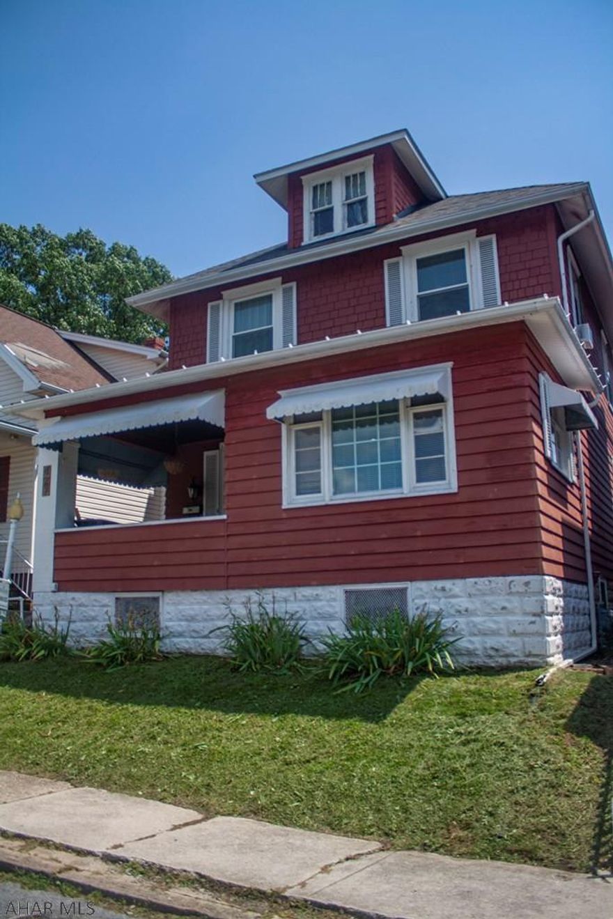 Stunning 2 story home With a fenced in yard and 2 car garage ..Stunning  Kitchen has granite counter tops and newer flooring.  Dining room is opened up with a bar counter top. Living room has a beautiful fireplace for relaxing .Upstairs has a nice size full bath  and 3bedrooms with a possible 4th bedroom in the finish walk up attic. Enjoy outside time on the front porch or back patio. Schedule your tour