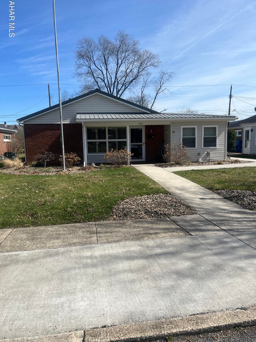 Well maintained 3 bedroom brick/vinyl rancher that has been totally remodeled. Addition offers a spacious room with built ins for a nice bonus/family room. Enjoy entertaining in the spacious covered patio that is covered and tiled for year round access. Newer kitchen, bath, flooring, metal roof, heating, electric, sidewalks, tailored closet built ins and hideaway bed.