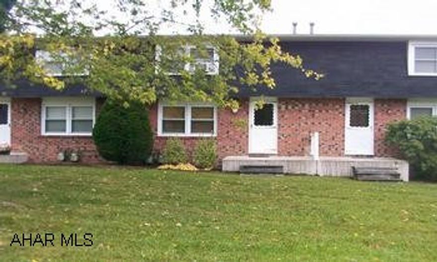 Don't rent it - Own it! Well maintained 2 BR townhouse with basement. Monthly Association Fee $140 - includes all outside maintenance, roof, trash, swimming pool, grass cutting, snow plowing. Seller is selling living room furniture and bed in bedroom.