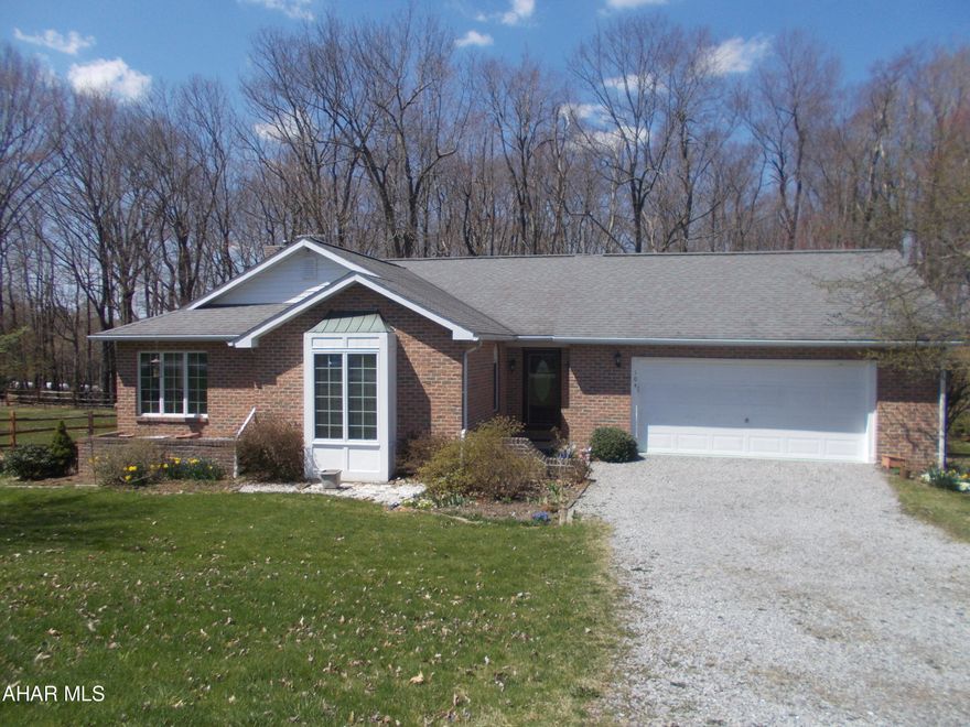 If you always wanted a super nice one story close to the Summit Country Club, this one is for you!
Classic natural woodwork throughout, large bright and sunny EIK with French Doors to screened in porch to enjoy the private backyard., cherry cabinets. Cozy living room with brick fireplace - French doors to porch.  Large bedrooms and bath with jacuzzi and partially finished basement.