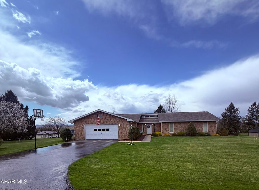 Welcome to 604 Sunset Drive in Martinsburg.  This cove stunner sits on over an acre, with views from all sides. Inside you will find beautiful vaulted ceilings, 3 spacious bedrooms, and two bathrooms. The large kitchen and dining room will be a entertainers dream with a large deck to flow to the outdoors.  A main floor laundry room along with a house generator are just two of the things you will love about this home.  The basement floor has a large finished family room with an office.  Storage is not a problem with a large storage room off of the family room for all your organizational needs.  This one is a rare opportunity in Martinsburg schedule your showing today!!