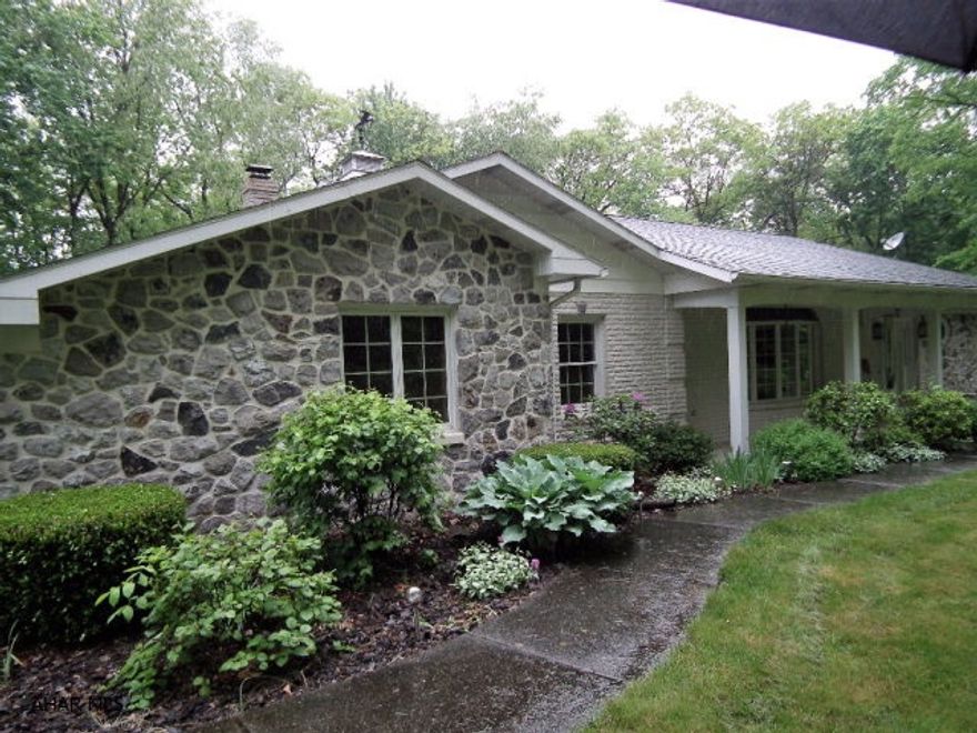 All brick & stone home in a sylvan setting. Plaster walls throughout, home was built by seller & boasts large rooms w/ swirled ceilings. Kitchen has granite counters & S/S appliances. 1st floor oversized laundry, 3 baths, attached oversized 1 car garage, 3 zones. 2.87 acres. Shed/workshop included.