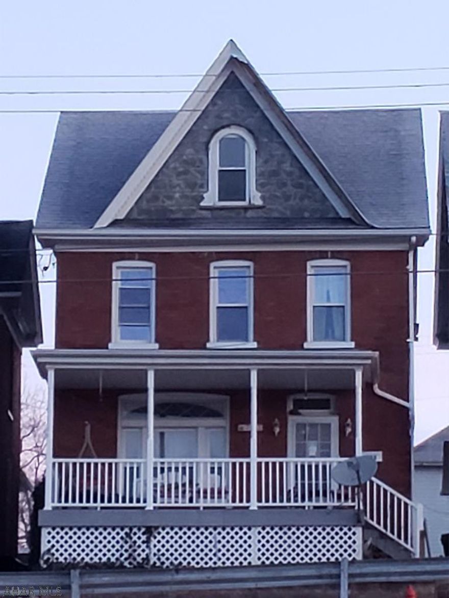 Modern spacious interior in this 3 bedroom/2 bedroom home. Family room on first floor as well as full bathroom and laundry. Updated kitchen with stainless steel appliances and soft close cabinets and drawers. Maintenance free front porch, newer replacement windows and new door. This lovely home is ready for your family!