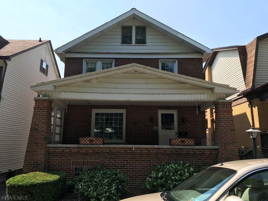 Spacious family home features 4 bedrooms with a heated attic for additional living space.  The kitchen has a breakfast bar, all appliances, a double sink plus a single sink beside the range, and an exit onto a large deck.  The pool table in the basement level is included.  There's a newer 3/4 bath on the first floor, a full bath on the 2nd floor and in the basement.  Large closets throughout.  New electrical box with circuit breakers. A two car detached garage with new vinyl siding and an automatic opener keeps your cars out of the weather.   The brick has been repointed and most of the windows tilt in for easy cleaning.