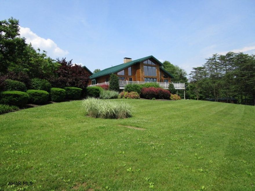 This property offers the ultimate in privacy and a park like setting. Situated 228.37 acres of scenic meadows, woods, stream, large pond filled with different fish species, and miles of private trails. The superbly maintained log home offers magnificent views of surrounding mountains and wildlife from the inside or outside. Main level has a G.R. w/cath. ceiling, kit. w/custom cherry cabinets, formal dining, informal dining, den, L.R., half bath, and master suite w/master bath. Second level has 2-additional beds, full bath, and loft with endless views. Full fin. bsmt. with rec. room, bed, full bath & bonus room. Geothermal heating & cooling, security system with cameras, main. free decking, 2-car attached garage and 2-car detached garage. Guest house on property w/all separate utilities.