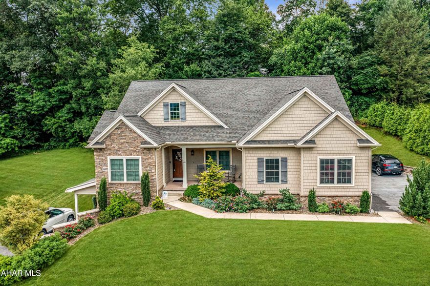 Exceptional custom-built home by Jeff Frye, ideally situated in Altoona's sought-after Highland Park neighborhood. Offering approximately 3,800 square feet of beautifully finished living space across two fully equipped levels, this home is perfectly suited for multigenerational living or potential Airbnb income. The main level features an open-concept layout with striking hickory hardwood floors, a warm gas fireplace, and a chef's kitchen outfitted with black stainless steel appliances, quartz countertops, and custom cabinetry. Upstairs includes three spacious bedrooms, 2.5 baths, and a convenient laundry room. The walk-out lower level offers full independent living with two additional bedrooms, a den, a second full kitchen with quartz countertops and stainless appliances, a private laundry area, and its own exterior entrance. Additional highlights include hot water baseboard heat with an added heat pump, a two-car garage, two separate driveways, a 10x12 shed, and professional landscaping. Built in 2017 with robust Imperial foundation walls, this home combines energy efficiency with long-lasting quality. Set on a gently rolling lot with public utilities in a quiet, established area, this turn-key property is a rare find. Don't miss the interactive Matterport 3D tour—schedule your private showing today!