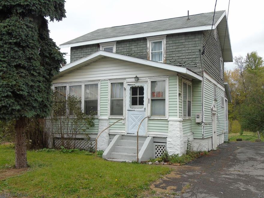 **Investor Special** Don't let this investment property pass you by!  Located in the Hollidaysburg School district on a dead end street, this home has true potential. This home has a spacious livingroom, dining room off the kitchen, and a first floor laundry room. It offers 3 bedrooms and 1 large bathroom.  This home has a great backyard with a stream!  The furnace and water heater are newer and the roof was replaced in 2011. New windows have been installed on the second floor.  It also offers 200 amp service.