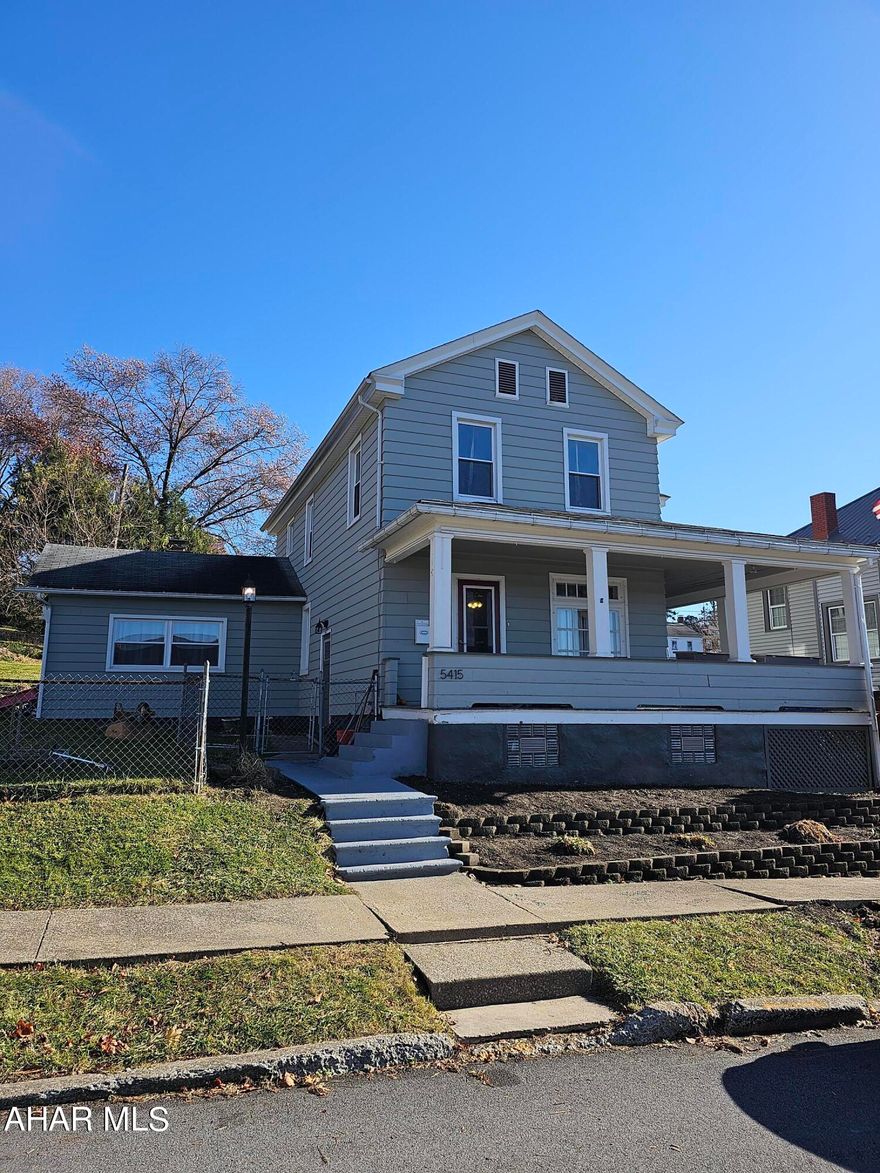 3 bedroom large home. Livingroom, kitchen, dining room, and a fireplace in the family room. Half bath and laundry on the first floor. Home has a wrap around front porch and a huge fenced yard in a great neighborhood. Oversized garage and off-street parking. This home is move in ready with a NEW kitchen and new flooring in many rooms. Don't miss it!