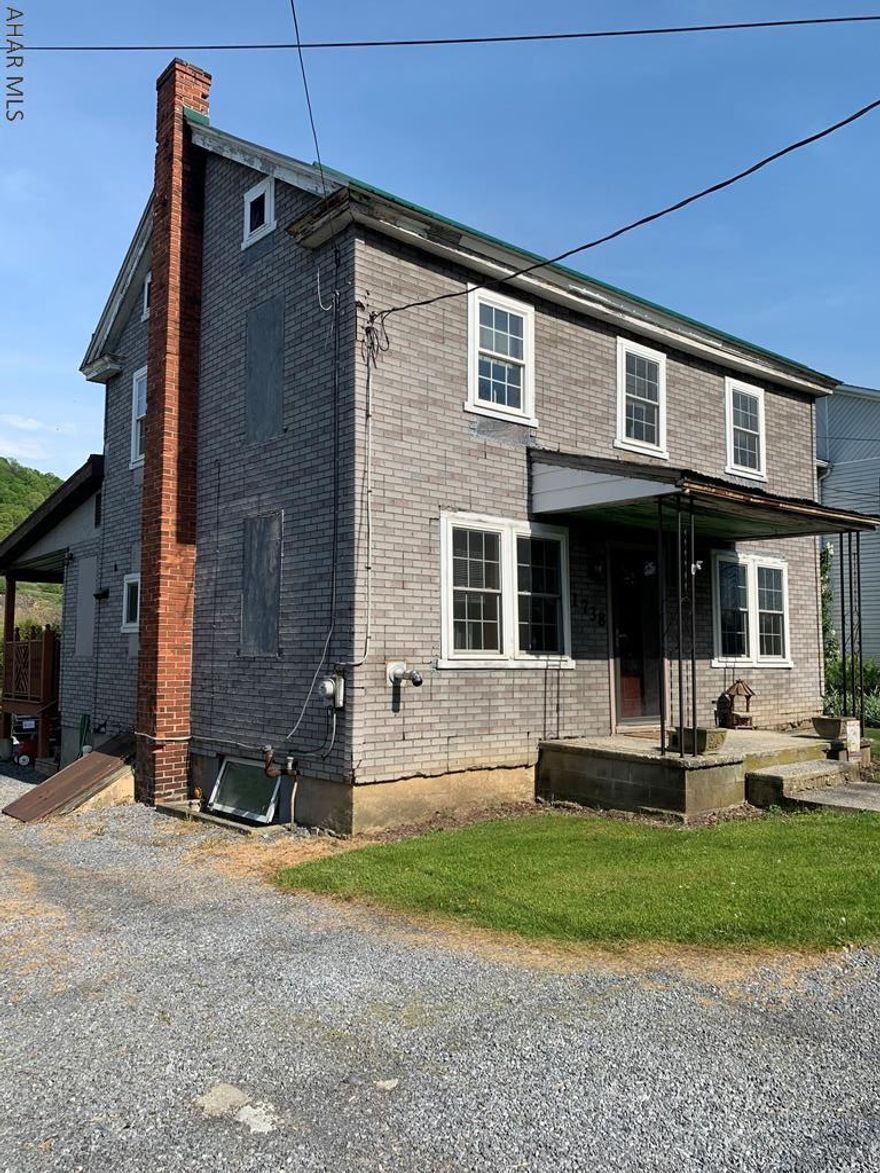 Charming two story home ready for you to call Home Sweet Home!!  Move in ready and many updates.  Large kitchen with pantry and lots of counter space.  Flows right into the dining area and office.  Spacious living room with a 1/2 bath on main level.  2 bedrooms and full bath upstairs. Be sure to check out the hand railings... Handmade from a tree cut down in the back yard!!  Wow the views!  Sit and relax on your covered deck and check out the views! Nice yard space for all your gatherings!  Large parking area behind the home.  Northern Bedford School District.  A must see!! AWSOME home waiting for you!!