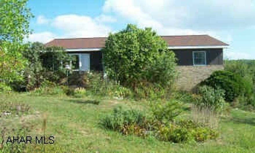 Country setting - over 1 acre, 3 BD, 2 separate lg garages 15x 56 2 story and 30x30 2 story.