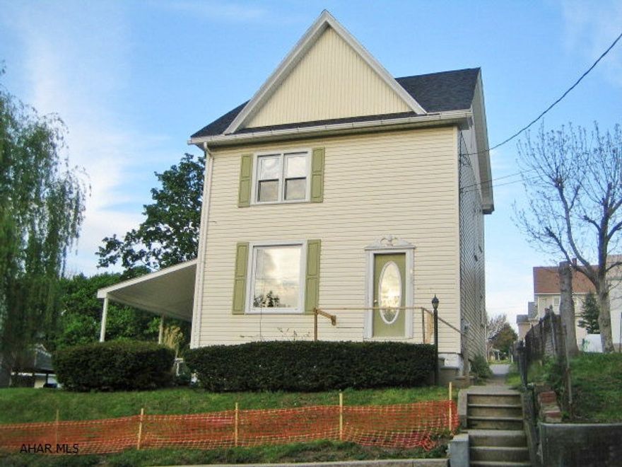Roaring Spring vinyl-sided 2.5 story could be your perfect dream home! Features updated kitchen, formal dining room, large living room and a spacious wrap-around covered concrete patio. 3 bedrooms, plus possible 4th in attic. Large, concrete block 2 car garage with semi-finished 2nd floor loft. Insulated glass windows, gas HW heat, 100 amp. breakers. Property sold AS-IS. Seller will make no repairs. Offers must be submitted through HUD approved broker. Buyer pays both transfer taxes.