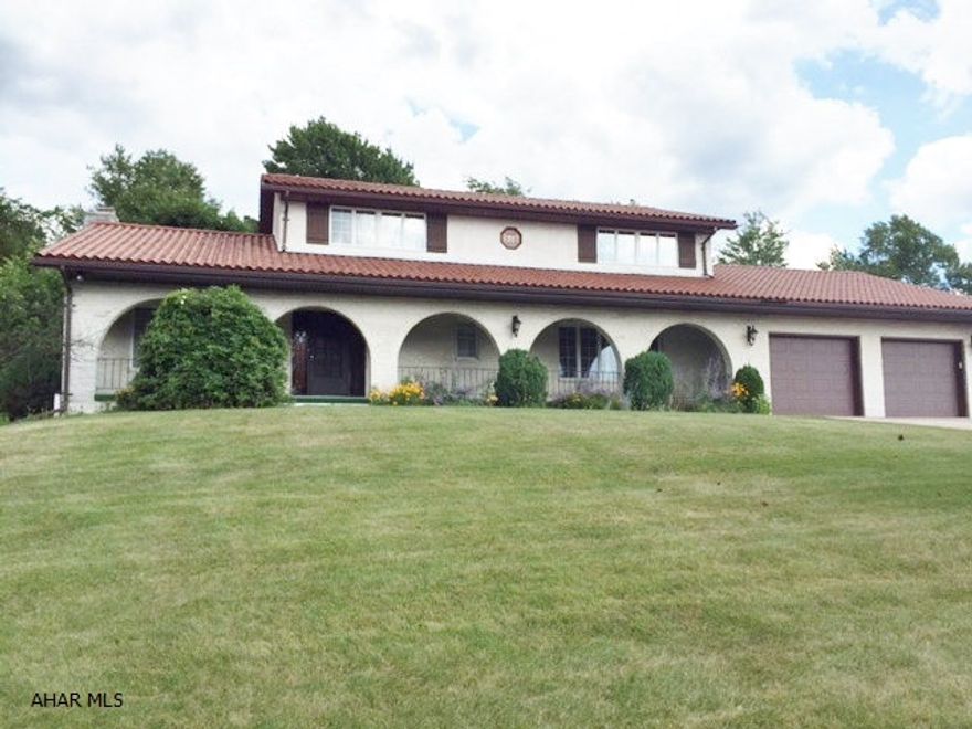 Unique Spanish style 4 bedroom, 3 1/2 bath, house close to golf course in Cresson! Large finished basement and stunning hardwood floors with beautiful fire places. 2 plus car garage this home had too many amenities to list! Great house .. Great Price!