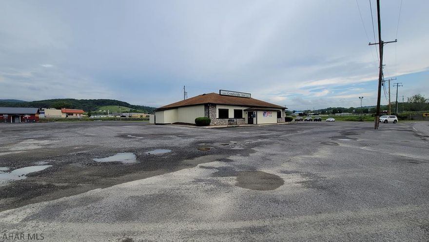 What sets this opportunity apart from all other restaurants offered for sale?  Start with location, location, location! This business has been revitalized because of the seller's ability to make the necessary improvements both to the building and menus! Profits are setting record numbers each month! The kitchen features almost all new, energy efficient equipment including TurboAir refrigerators, freezers, a state of the art dishwashing system and 2 new Bosch heat/A/C systems. New LED lighting, ADT security system and an ultra-modern TouchBistro Order System. Lets not pass over that this property sits on just under 2 acres with a first-right-of refusal to purchase an additional acre. This sale will be ready for you to step into, turn key, everything included as well as a Liquor License!!