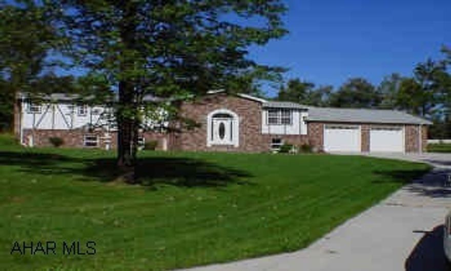 Breathtaking foyer w/marble tile, fireplace, whirlpool tub, finished basement, 2 furnaces, deck, and concrete driveway. Beautiful 4 BR, 2 3/4 bath, doublewide with additions, finished basement and large 2+ car garage beautifully decorated on 2.2 level acres. Must see inside - a great find in the country! Only 15 minutes from Altoona. Sale pending, but 4 day wipe-out clause.