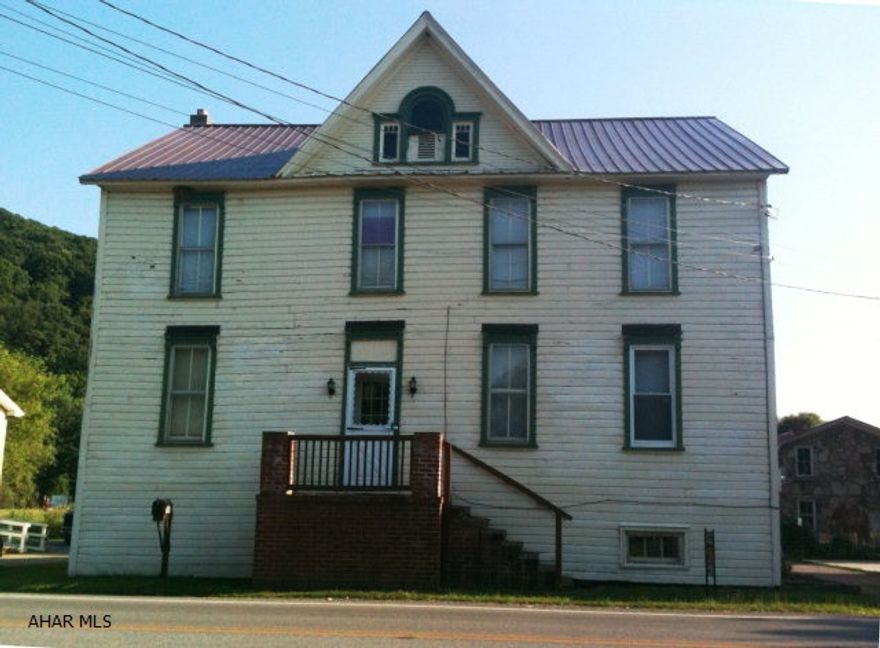 If you are looking for a weekend retreat/hunting lodge, a rental property or a place to call your own this could certainly be it! This two story, 5 bedroom has updates such as some lowered plastered ceilings and drywall yet maintains it charm by still boasting of original hardwood staircase, plank flooring and 2 feet deep window sills in the front room!  You can see Yellow Creek and state games lands from your backyard but are minutes from convenience stores, banks, and schools.  There is potential to make this into a two unit rental.