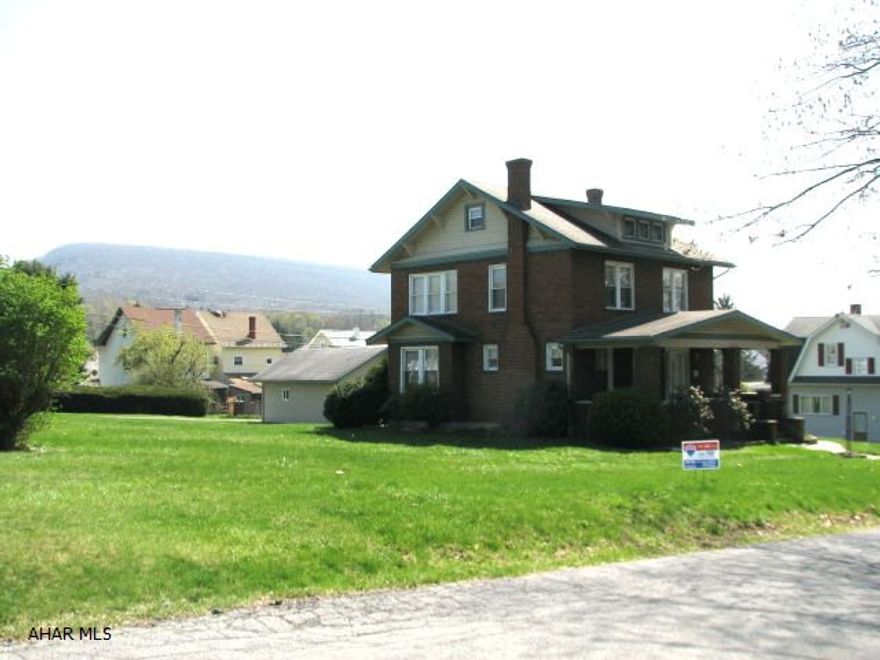 Stately brick home on the East End. Large covered front porch, brick patio, 2-car garage w/attached shed, great neighborhood, large double lot. An additional lot to the left of the house is also available (Tax ID 1.10-16-21). This lot will be listed for $18,500. The set backs are: Front-15', Sides-2', Back-30' for a house, and 7' for a garage.