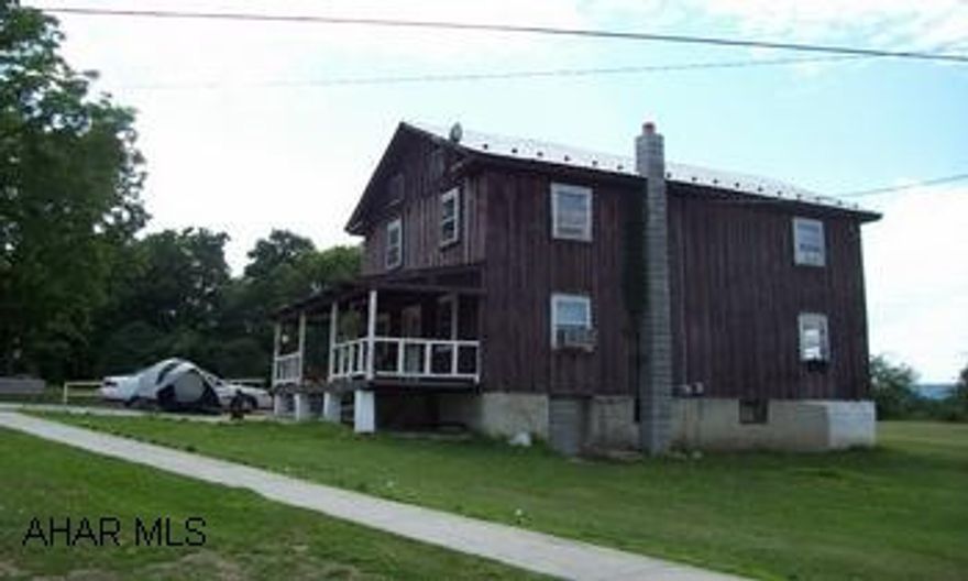 PA 866 to Royer RD turn onto Royer RD at church travel approx 2 miles to stop sign house is to your right at intersection. Sale contingent upon subdivision approval.  Realtor owned.  Seller to install new septic.  Buyer to drill well, current water source via cistern.