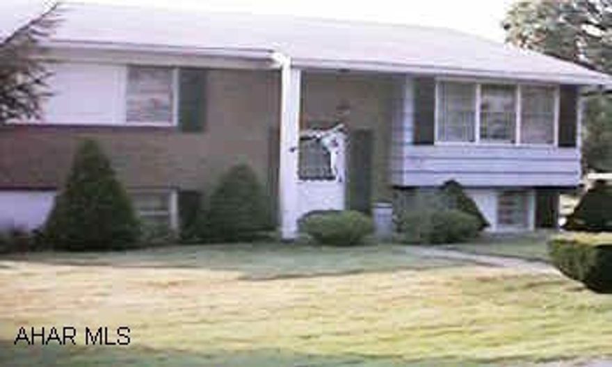 Nice bi-level with hardwood floors.  Great area.  Flat lot.