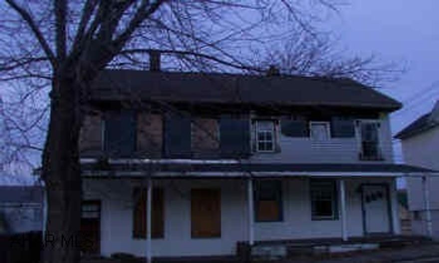 Double house in need of rehab.  Condition of plumbing and heating systems unknown.  Seller is licensed realtor.  Shingle roof. Double house in need of rehab.  Condition of plumbing and heating systems unknown.  Seller is licensed realtor.  Shingle roof.