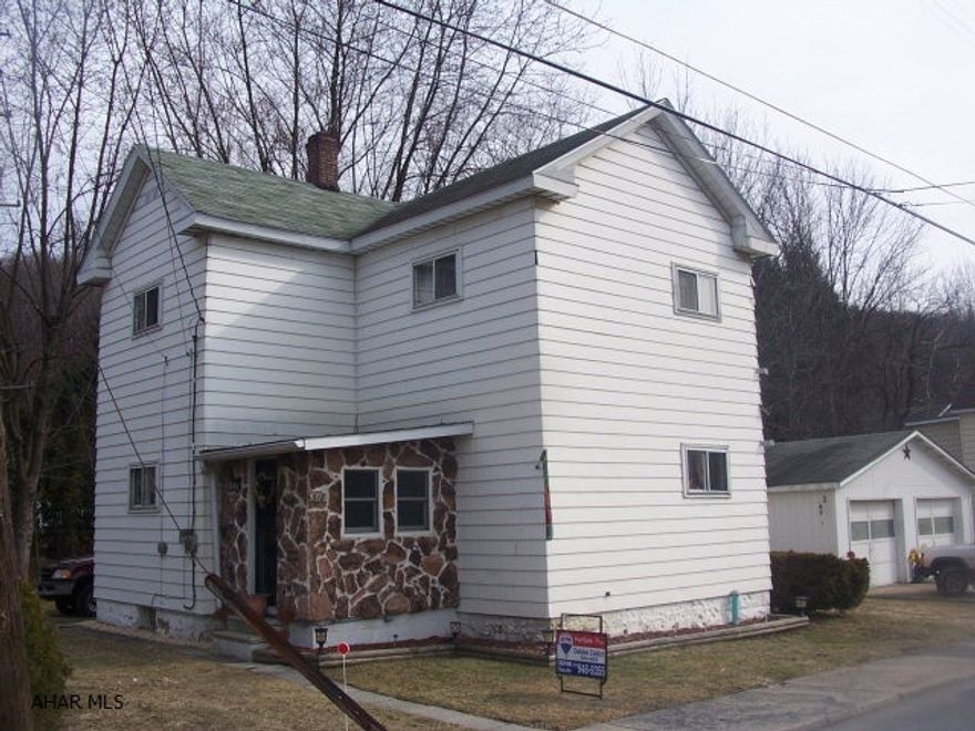 Nice 3 bedroom 1 bath 2 story with 2 lots, 2 car garage, great starter. 800 Allowance for front porch repair.