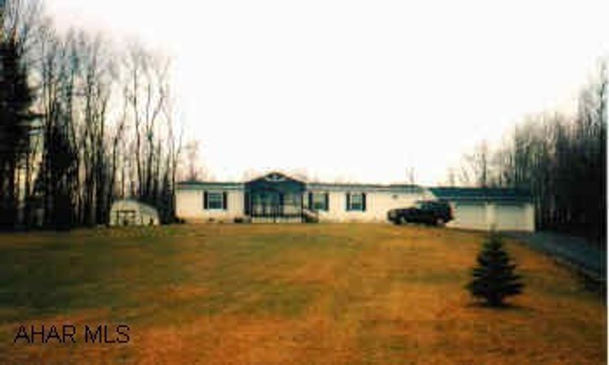 3 bedroom, 2 bath doublewide 1999 1999 Skyline Doublewide with 3BR/2BA, family room with fireplace and built-in entertainent center, kitchen with oak cabinets and island, dining area with china cabinet, skylights in kitchen and baths, drywall, oil or kerosene FA heat, central air, 1 acre lot, owner must find suitable housing