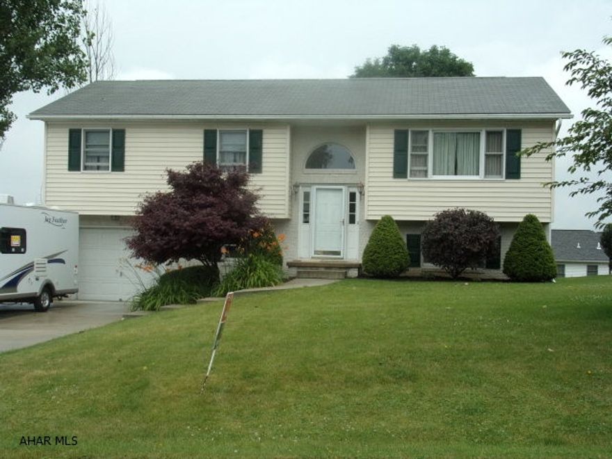 Very well maintained bilevel on nice lot with good views.  Living room has vaulted ceiling.  Formal dining room with french doors to rear deck.  Modern kitchen with all appliances.  Lots of room in lower level with a family/rec room, office, 1/2 bath, laundry.  Quiet area in Logan Township.  Logan Elementary!