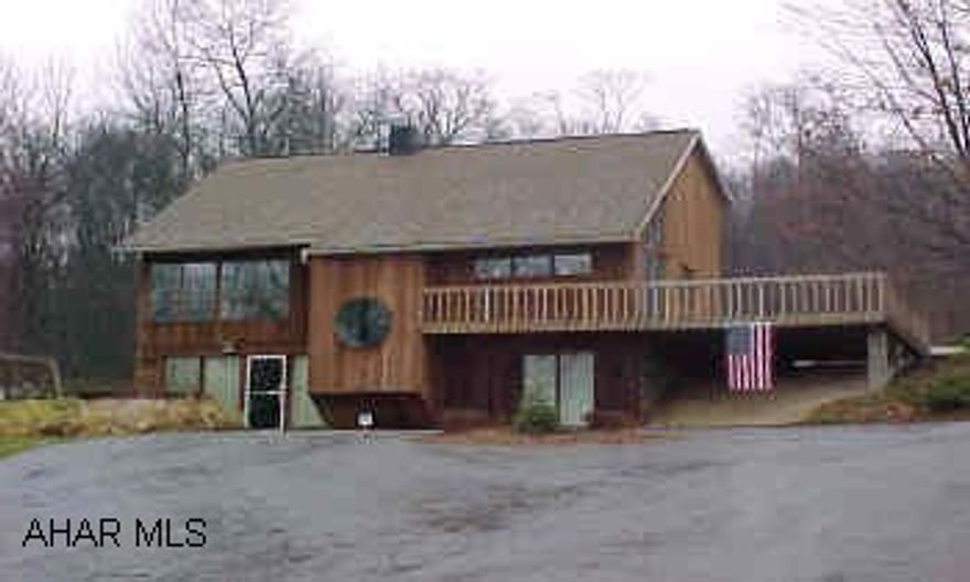 Great cedar contemporary on 6.67 AC.  Recently approved for subdivision.  Big 3 car garage with workshop.  Hot tub stays.