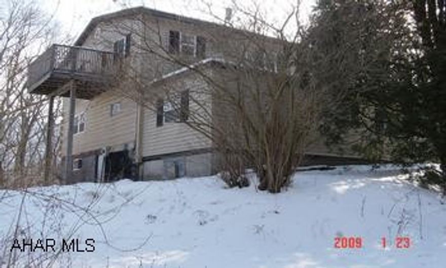 Walking distance to Rails to Trails and Juniata River. House has 2nd Floor apartment. 2 Car garage has 2nd Flr. Needs work. May have freeze damage. Sold "AS IS WHERE IS". Seller requires prequal letter with offer. Call agent regarding free appraisal and credit report offer.
