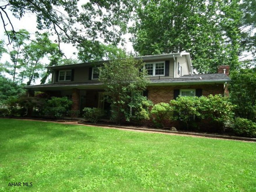 Relaxer's Pardise! Just off 54th Street, but secluded. This 5 bedroom, 3 bath home is nested among mature trees and features plenty of elbow room between you and your neighbors. Open floor plan in kitchen and eating area, formal living room, dining room, enormous family room with fireplace, an abundance of closets and storage space, den/office, full bath 1st floor, 1st floor laundry. All of this on 1.5 acre. Seller will escrow $5000.00 for pool opening. Agent is related to seller. Drastic Reduction, Priced to Sell!