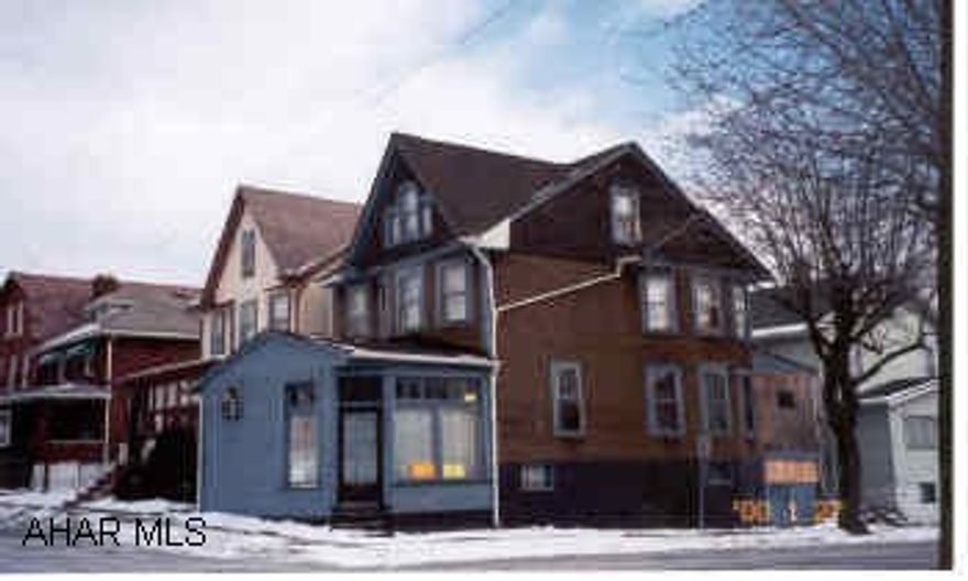 Newer Roof, Furnaces, Wiring, - very neat inside. 20' x12' store room on front. Price reduced.Seller will entertain reasonable offers.