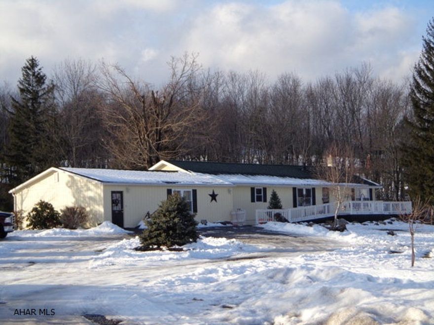 Well maintained ranch home w/32'x28' addition, partial bsmt, part finished on 3.8 ac. This home has 3 BR, 2.5 Baths, Lge kit w/service bar, Master BR w/full Bath, den/off, laundry & possible home business room w/built-in shelving & srvc counter. Part finished bsmt w/3 BR, Fam room, Kit, full Bath & exterior entrance, also has out bldgs, pond, fruit trees and much more.