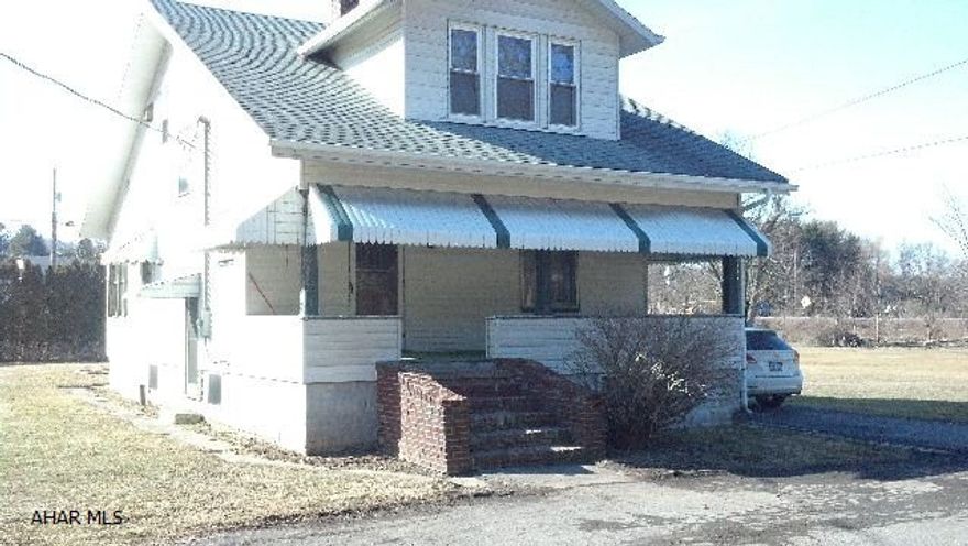 Solid 1 1/2 story - needs some updating, but a spacious home with mostly new windows, hardwood floors. Oversized, detached 1-car garage with attached storage area. Additional large lot maybe included, depending on accepted sale price.
