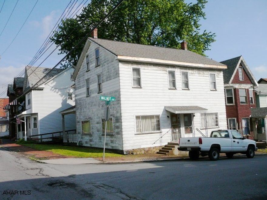 MONEY MAKER! DON'T MISS OUT! AN UNBELIEVABLE PRICE! A great investment opportunity! Use as rental, or, live in one side, rent out the other side. A lot of house for the money! New roof. Solid house. Sold AS IS. A must see of the interior.  Beautiful wood and woodwork.  Some hardwood floors. Side by side, 3 bedrooms and 1 bath each.  2 units.  Close to the Altoona Hospital.  One exclusion.  Take a look! Appliances for a price.  Talk with agent.