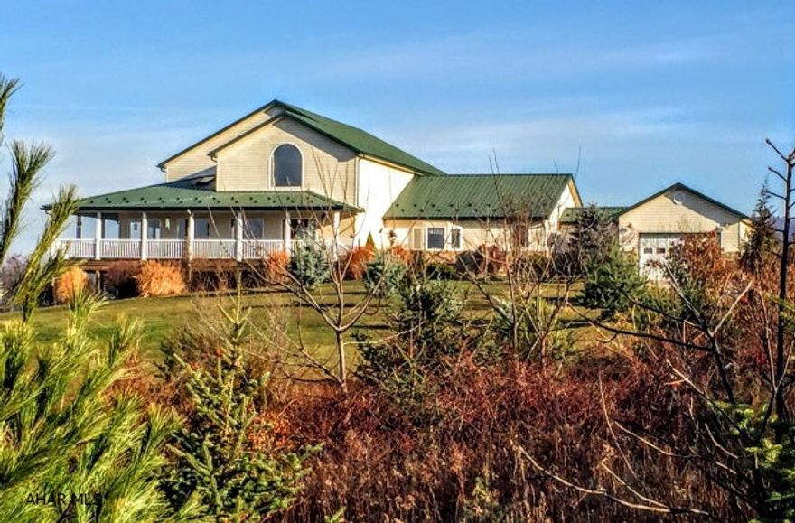 This secluded gem offers 115+ acres of a great habitat mixture of timber, thick brush, tillable acreage and water! Wildlife is plentiful, minutes to highways heading N-E-S-W. D.C. approx. 1.5 hours. Custom built open concept 2-story offers 5,200 sqft w/ 3-4 bedrooms and 4 baths. Enjoy all the views from the wrap porch. 70' x 40' barn w/ water, electric, 4 ponds, 2 streams and 7 fenced areas.