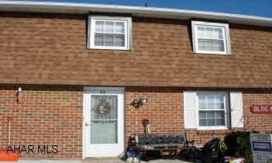 NO ASSOCIATION FEE!  NEW WINDOWS, DOORS, FLOOR COVERINGS, DECK, FENCED BACK YARD.  TWO HEAT SOURCES.  OAK KITCHEN.