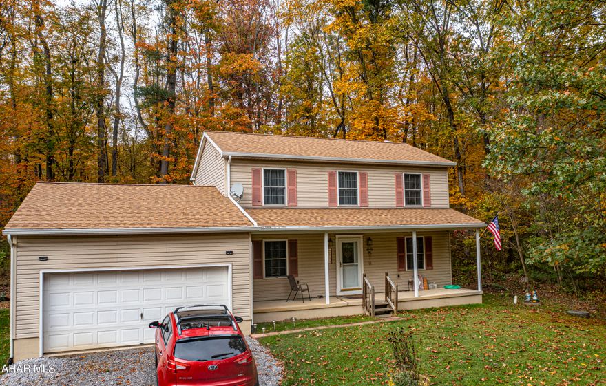 Secluded 4 bedroom, 3.5 bathroom home with 2 car attached garage situated on a private 2.5 acre wooded lot. On the main level you will find an eat-in kitchen, formal dining room, living room, half bath and the 4th bedroom with a full bath that would make a perfect office or in-law bedroom. Upstairs there are 3 nicely sized bedrooms with ample closet space and two full bathrooms. Brand new roof and rain gutters. Martin Kinetico water filtration system and UV light water conditioner installed last 2022. Central air system installed 2020. New carpet in second floor bedrooms and stairs, new vinyl plank flooring in second floor bathrooms all installed in 2023. Close proximity to State College, Huntingdon and Altoona with low Warriors Mark Township, Huntingdon County taxes. Check out our Matterport 3D virtual tour, floor plan and schedule a showing today.