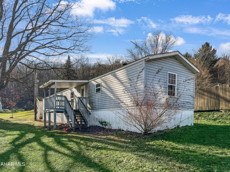 Welcome to 1715 Mott Street, a charming manufactured home nestled on a peaceful dead-end street within the Blacklick Valley School District. This inviting residence boasts three comfortable bedrooms & one & a half bathrooms. You'll love the expansive living area, as well as the generously sized kitchen, which offers ample cabinetry for all your culinary needs. The convenient laundry area adds to the home's functionality. Step outside to discover a delightful covered porch, an ideal spot for enjoying your morning coffee or evening relaxation. The spacious yard provides plenty of room for outdoor activities, while the shed offers additional storage options. Enjoy the convenience of off-street parking as well. Call today for more information on this wonderful home!