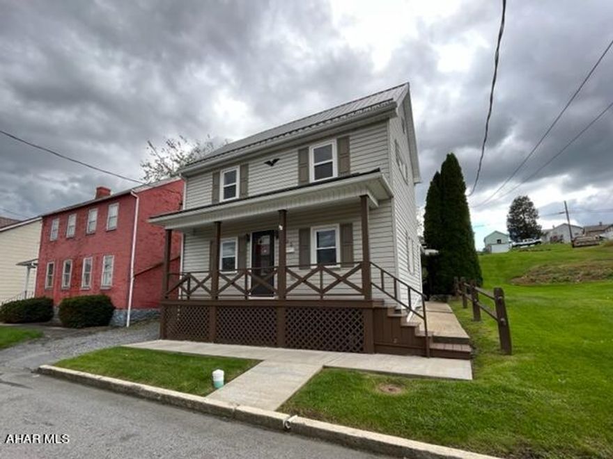 This well-maintained home has gorgeous woodwork, a large, beautiful addition, new carpet, new roof, quality insulated windows, unique covered deck/porch, workshop, garage/port with electric door, and it comes with all the appliances. Located in trail town Williamsburg, this home is a block from Riverside Park with its baseball and football field, basketball and tennis court, play park, and covered pavilions, and it has easy access to the Lower Trail. It is within walking distance of restaurants, food trucks, library, and the high school and grade school. It is move in ready!