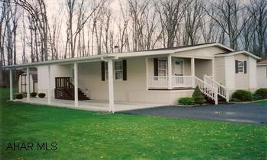 Very nice doublewide in excellent condition in Friendship Village. Covered deck, carport, Esh shed - A great buy! Very nice doublewide in excellent condition in Friendship Village. Covered deck, carport, Esh shed - A great buy! Lot rent is $190. per month. Must be pre-approved by park office.