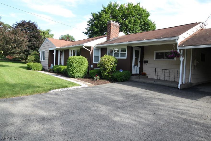 Captivating one floor living with large relaxing screened in patio and level yard. This ranch style home has 3 bedrooms, 1.5 baths on living floor, 1/2 bath in partially finished basement. It's located perfectly for an expansive view of a cozy welcoming neighborhood on low traffic streets. Upgraded eat in kitchen, central A/C, expanded laundry/utility room on first floor, efficient new furnace, security system, lots of built in storage, flat lawn, pocket doors separating some rooms, original hardwood floors, working central vac system and generous attic storage.  Quiet neighborhood with great lighting and views. Living room has wood fireplace and original hardwood floors. Many updates and very intriguing features, this house is a definite must see and easy to show!