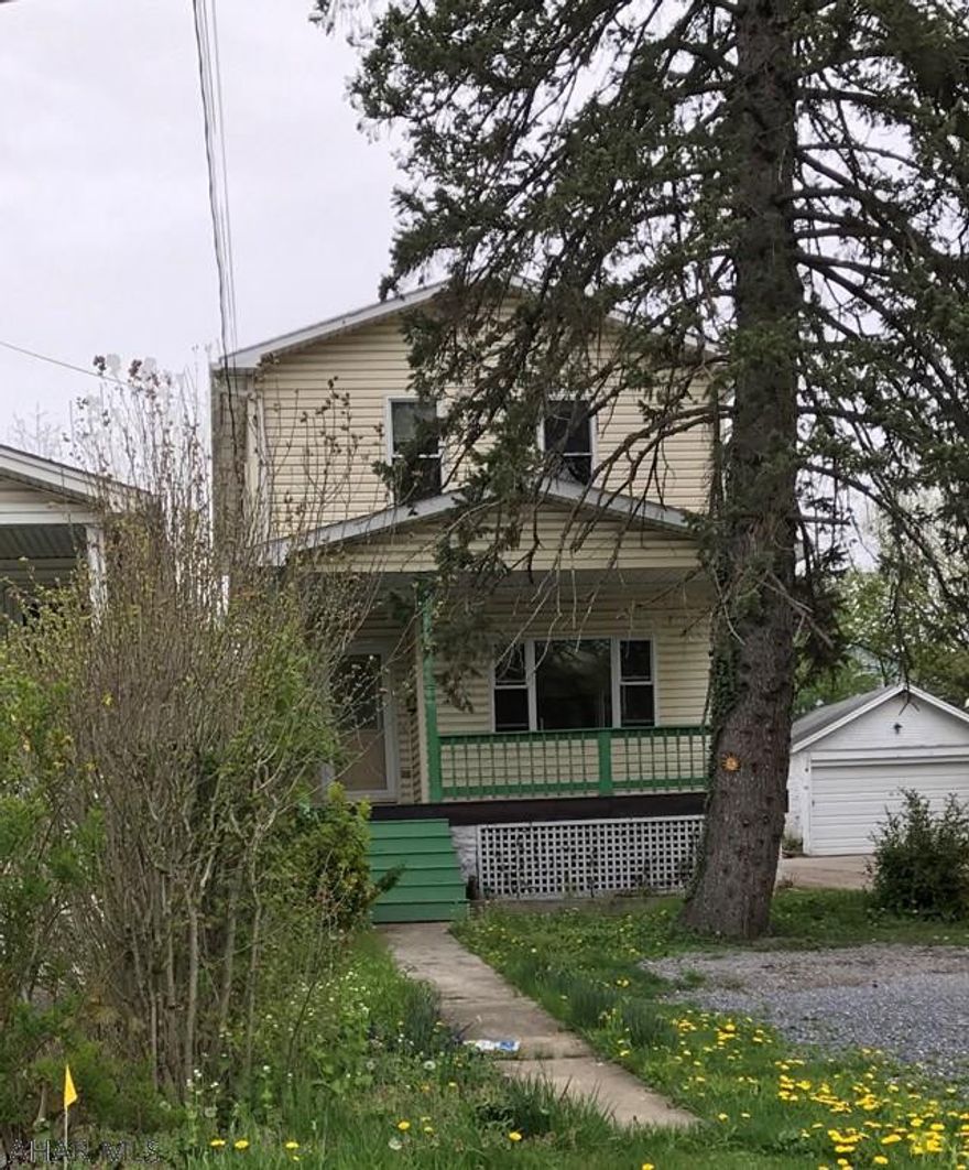 Move in ready, complete with updated kitchen and baths, new flooring throughout, new paint and trim. kitchen appliances and washer and dryer included. Off street parking.