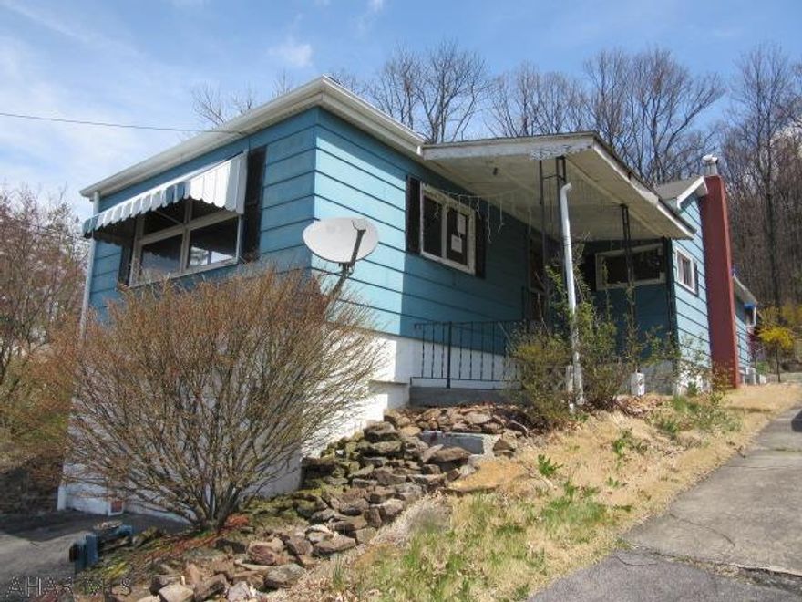 Great Location! Convenient to everything! One story raised ranch on a large lot with integral garage, 3 bedrooms, full bath, huge living room, some tlc will make this a great home, worth a look