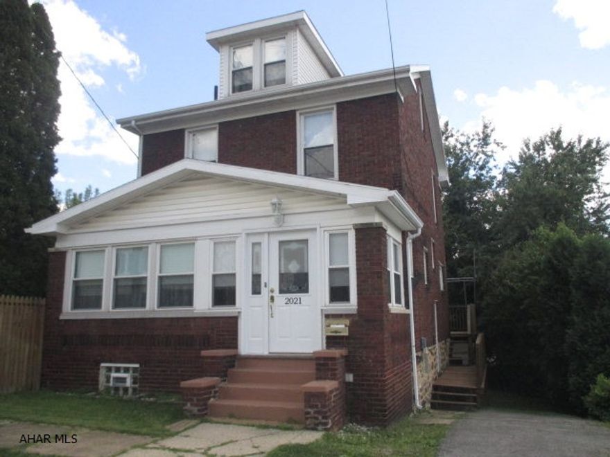 This spacious brick home offers a driveway, back deck, fenced-in double lot, new paint, French doors, a formal dining room w/ beautiful built-in cabinets and hutch, functional kitchen, large master bedroom and great walk-up attic that could be used for so many things! The seller is motivated to sell, so please, bring offers!