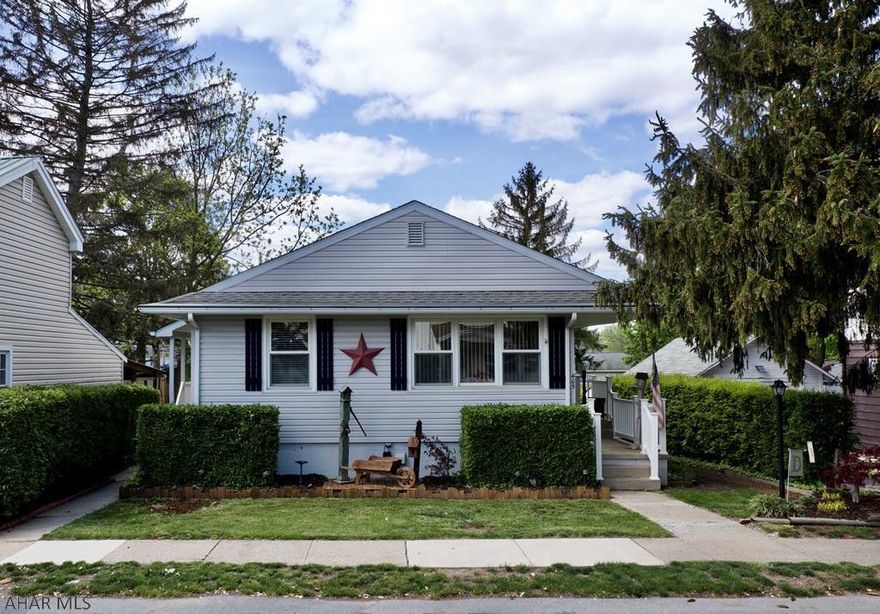 A wonderful, well maintained property in the heart of Hollidaysburg Borough. This home features a finished basement with a built in desk making for a relaxing, quiet office space. You will also find a full bathroom, and several spaces for storage, plus a workshop located in the basement. An enclosed porch with heat and lots of windows is perfect for enjoying all 4 seasons of Pennsylvania weather. First floor laundry is conveniently located between 2 nicely sized bedrooms and the upgraded main bathroom. This modern, eat-in kitchen is a must see, featuring included appliances and light washed cabinets.  There is even off-street parking with room for 3-4 vehicles.